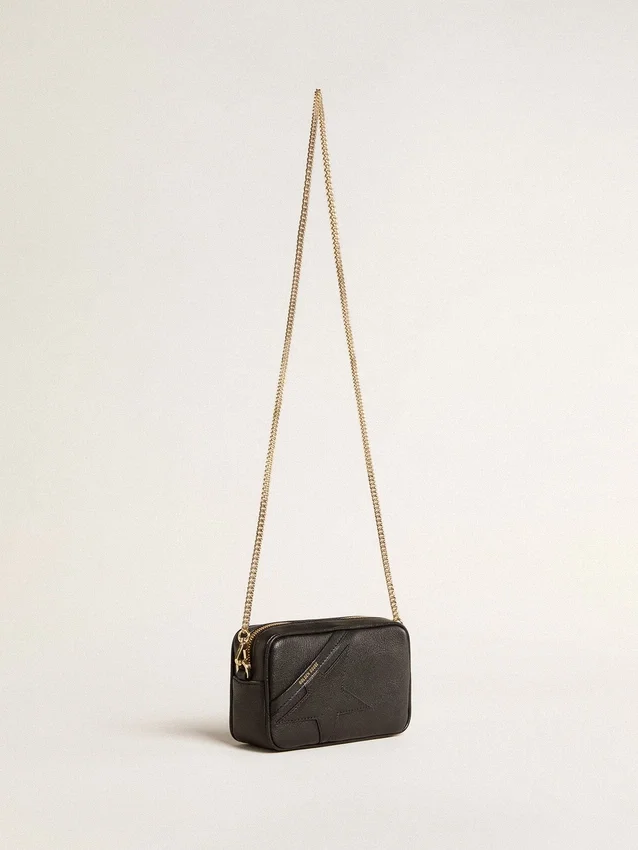Star Bag Mini de piel negra con estrella tono sobre tono