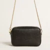 Star Bag Mini de piel negra con estrella tono sobre tono