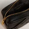 Star Bag Mini de piel negra con estrella tono sobre tono