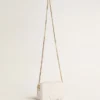 Star Bag «Mini» en piel blanco mantequilla con estrella tono sobre tono