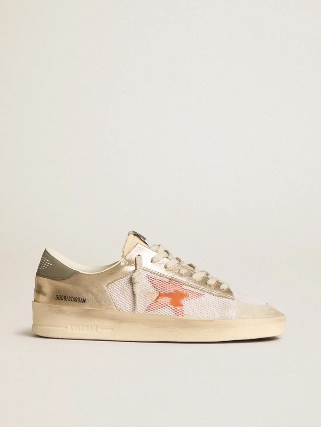 Stardan en malla blanca con estrella naranja e inserciones de piel platino