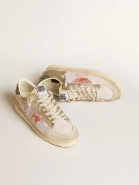 Stardan en malla blanca con estrella naranja e inserciones de piel platino