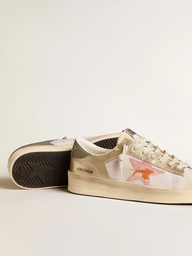 Stardan en malla blanca con estrella naranja e inserciones de piel platino
