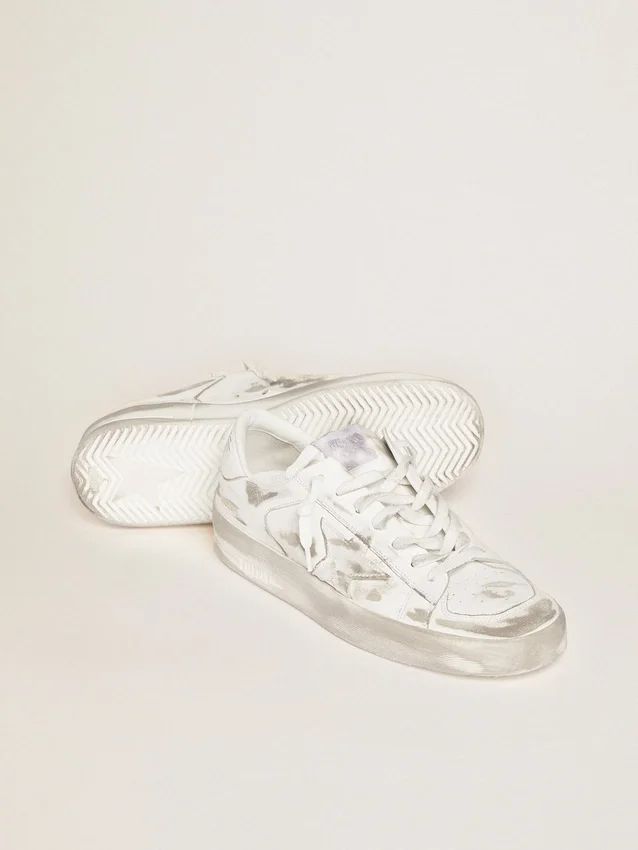 Zapatillas Stardan de piel blanca con acabado desgastado