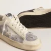 Stardan en piel blanca y malla con estrella de piel blanca