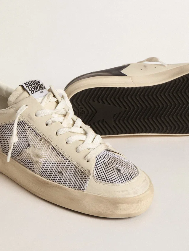 Stardan en piel blanca y malla con estrella de piel blanca
