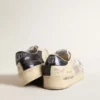 Stardan en piel blanca y malla con estrella de piel blanca