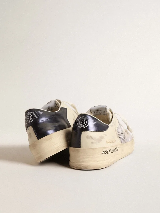 Stardan en piel blanca y malla con estrella de piel blanca