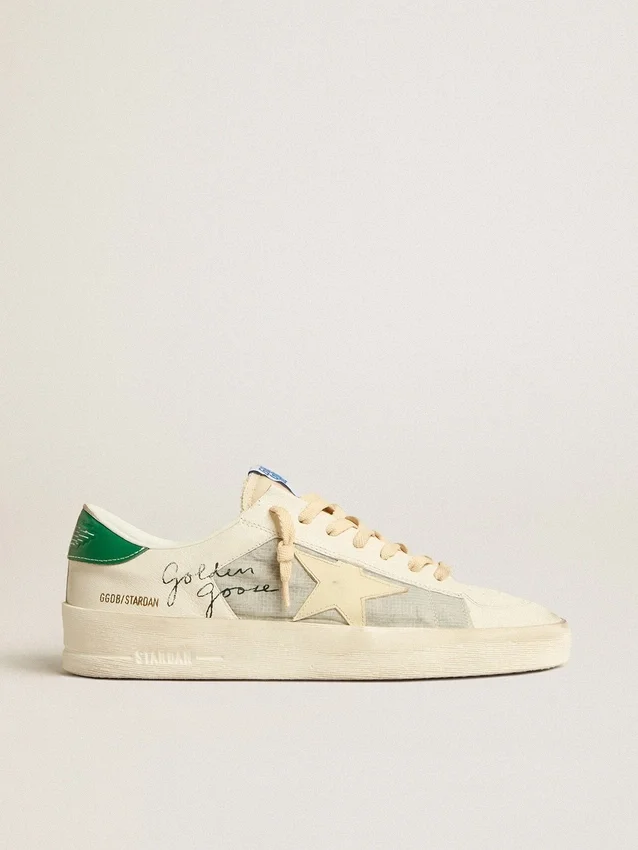 Stardan en piel napa blanca con estrella de piel de color crema