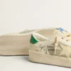 Stardan en piel napa blanca con estrella de piel de color crema