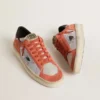 Stardan LTD en ante y malla de color coral con estrella de piel negra
