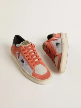 Stardan LTD en ante y malla de color coral con estrella de piel negra