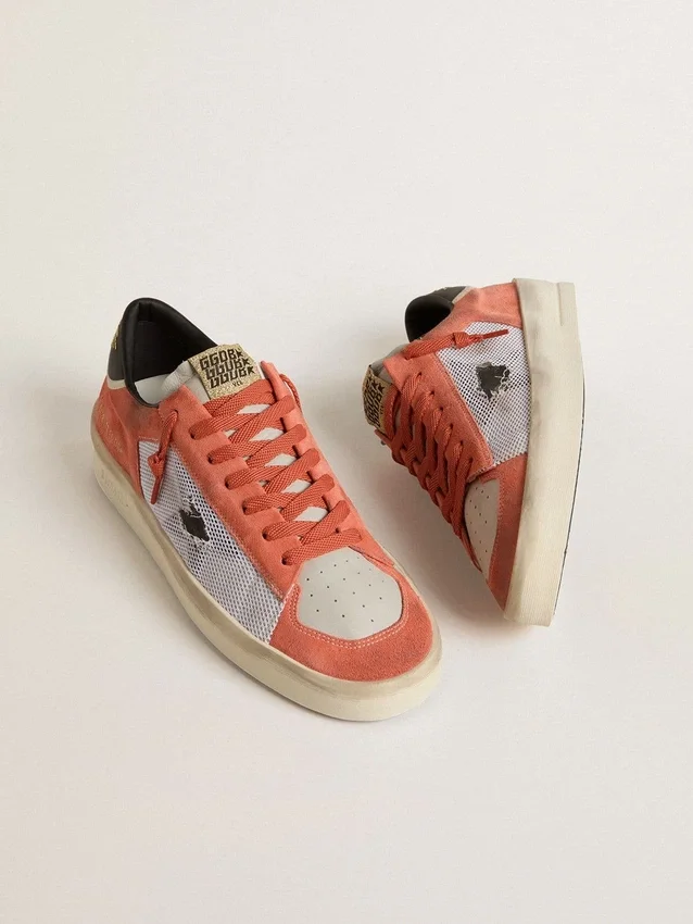 Stardan LTD en ante y malla de color coral con estrella de piel negra
