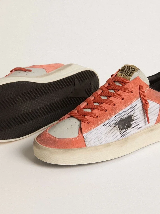 Stardan LTD en ante y malla de color coral con estrella de piel negra