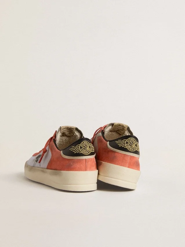 Stardan LTD en ante y malla de color coral con estrella de piel negra