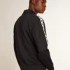 Sudadera azul oscuro con raya blanca y estrellas azules en contraste