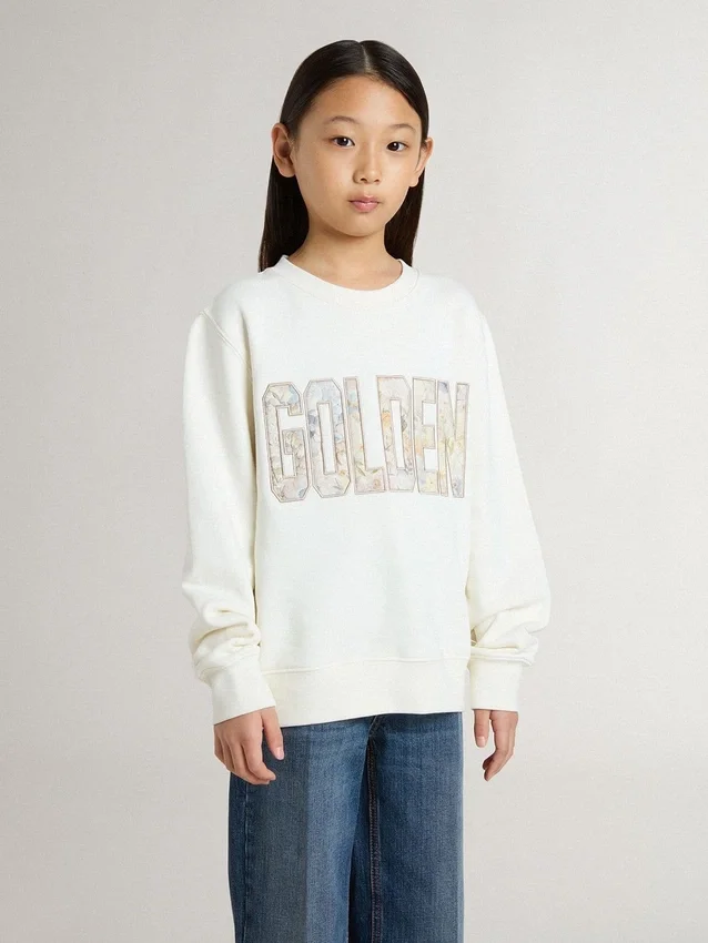 Sudadera blanca para niñas con letras doradas multicolores en la parte delantera