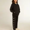 Sudadera con capucha para niños en negro con estrellas plateadas en contraste