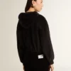 Sudadera con capucha y cremallera para mujer, de mezcla de algodón, en color negro