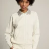 Sudadera con cremallera de la Star Collection en blanco papiro, con cuello de cristales