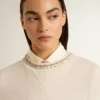 Sudadera corta de algodón color crema para mujer con cristales en la parte delantera