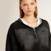 Sudadera corta gris con efecto desgastado