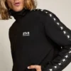 Sudadera negra con cremallera para hombre y estrellas blancas