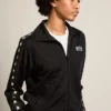 Sudadera negra con cremallera para mujer y estrellas blancas