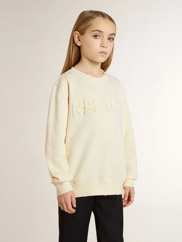 Sudadera para niñas de color crema con letras en parche