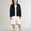 Sudadera polo infantil de algodón blanco con bordado en el pecho y estampado en la espalda