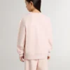 Sudadera rosa para niñas con letras rosas en la parte delantera