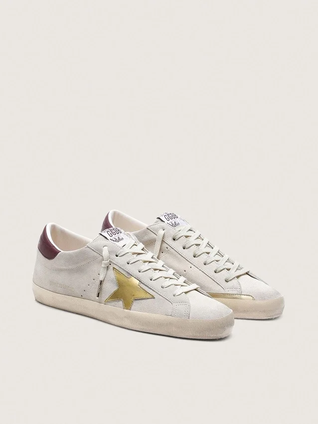 Super-Star CNY para hombre en ante marfil con estrella de piel metalizada y lengüeta del talón de piel