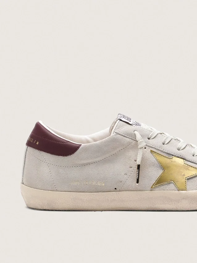 Super-Star CNY para hombre en ante marfil con estrella de piel metalizada y lengüeta del talón de piel