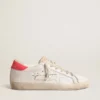Super-Star de piel blanca para mujer con estrella perforada y lengüeta de nylon fucsia en el talón
