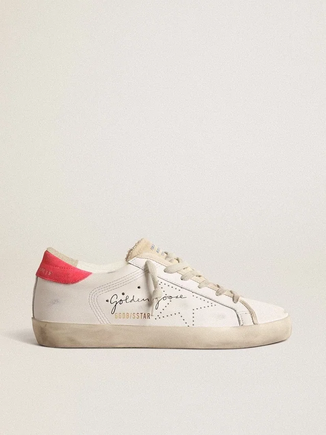 Super-Star de piel blanca para mujer con estrella perforada y lengüeta de nylon fucsia en el talón