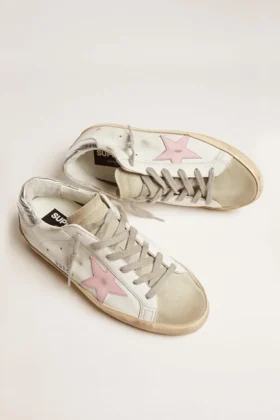 Super-Star de piel para mujer con estrella rosa y lengüeta plateada en el talón