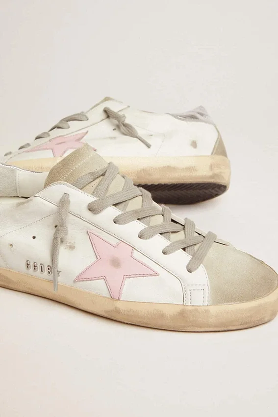 Super-Star de piel para mujer con estrella rosa y lengüeta plateada en el talón
