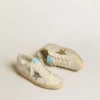 Super-Star en piel y ante blancos con estrella de piel plateada y dorada