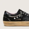 Super-Star LAB para mujer en ante laminado negro y nailon, con estrella en relieve y cordones con cristales