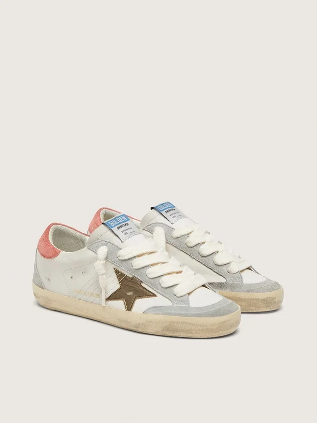 Super-Star LTD para mujer en piel blanca con estrella de bronce metalizado