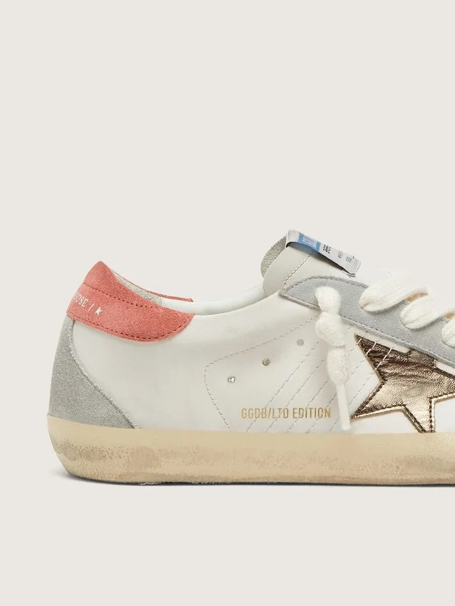 Super-Star LTD para mujer en piel blanca con estrella de bronce metalizado