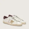 Super-Star para hombre con estrella de ante color arena y lengüeta trasera de piel con estampado de cocodrilo rojo
