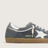 Super-Star para hombre en ante gris con estrella de piel blanca y lengüeta trasera de piel plateada