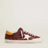 Super-Star para hombre en ante rojo ladrillo con estrella de piel blanca y lengüeta en el talón con estampado animal