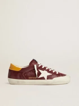 Super-Star para hombre en ante rojo ladrillo con estrella de piel blanca y lengüeta en el talón con estampado animal