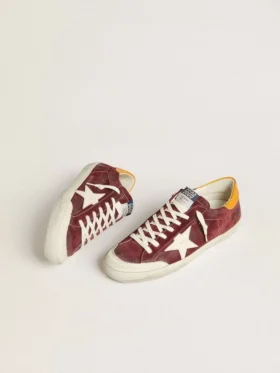 Super-Star para hombre en ante rojo ladrillo con estrella de piel blanca y lengüeta en el talón con estampado animal