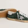 Super-Star para hombre en ante verde con estrella de piel metalizada plateada y lengüeta de piel en el talón
