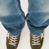 Super-Star para hombre en ante verde oliva con estrella de piel blanca