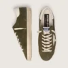 Super-Star para hombre en ante verde oliva con estrella de piel blanca