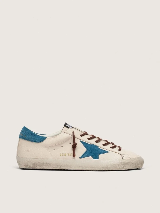 Super-Star para hombre en piel blanca con estrella de ante turquesa